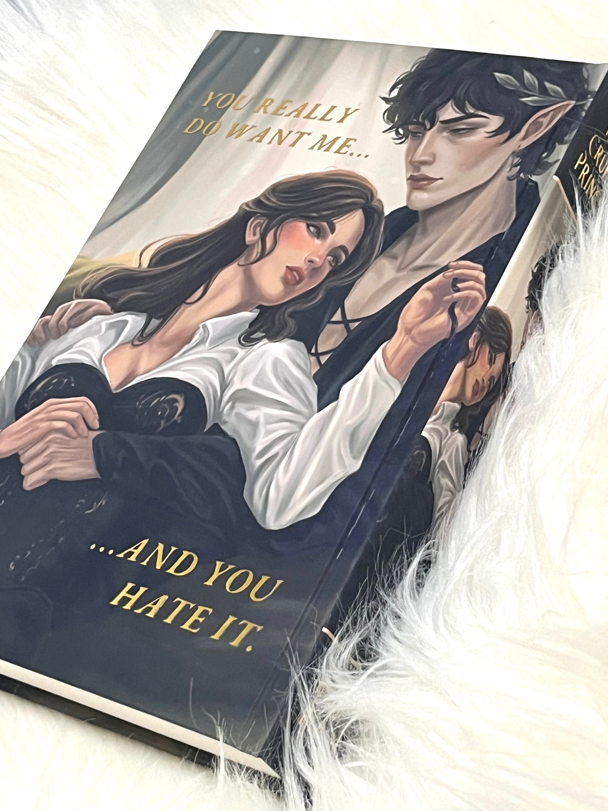Book cover with an illustration of a couple and text on a white surface